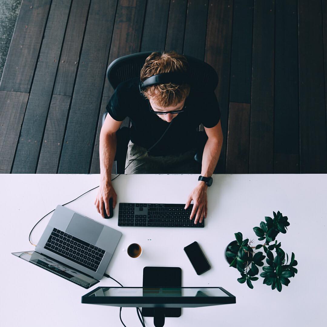 Birdseye view of digital marketer at work
